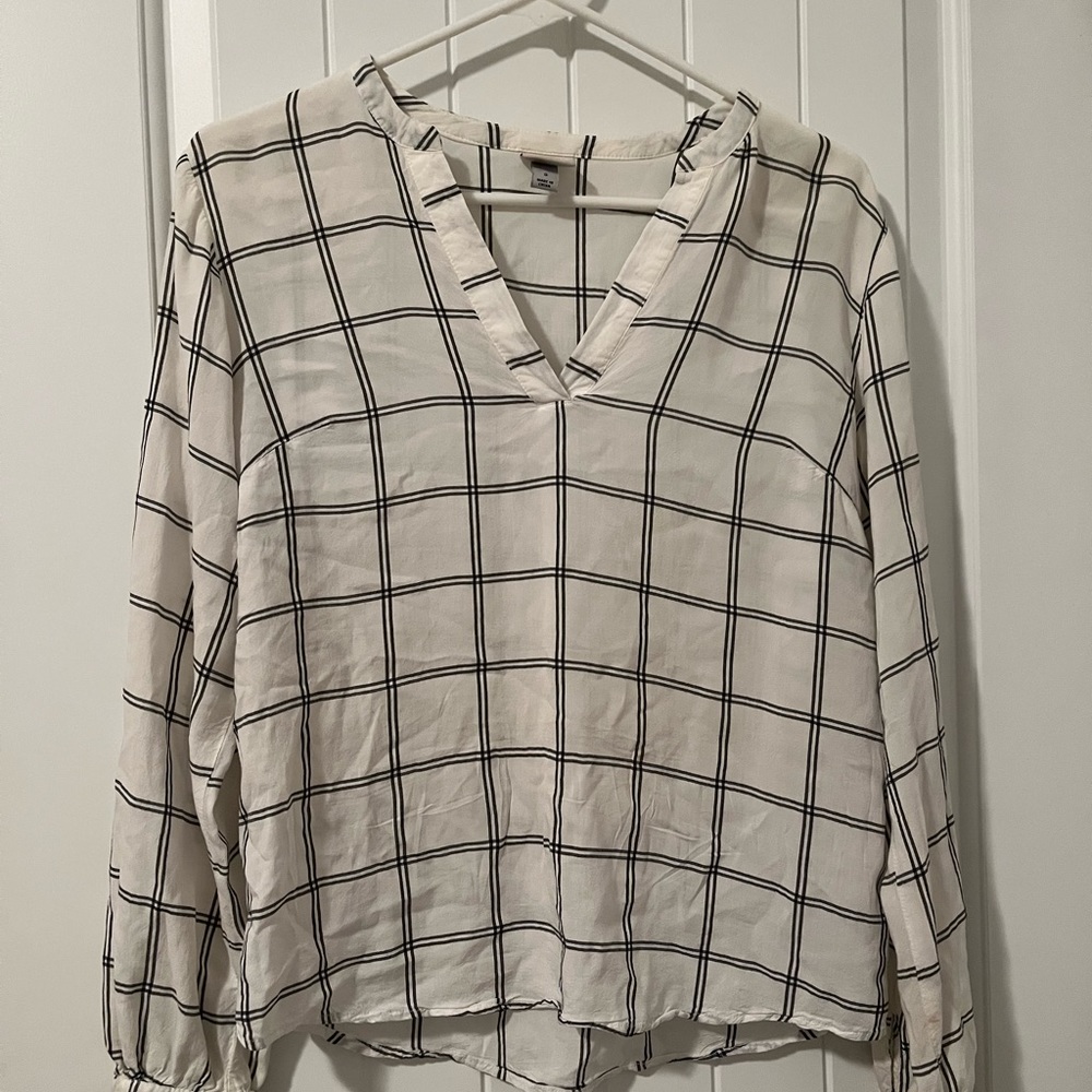 Black and white lined long sleeve blouse